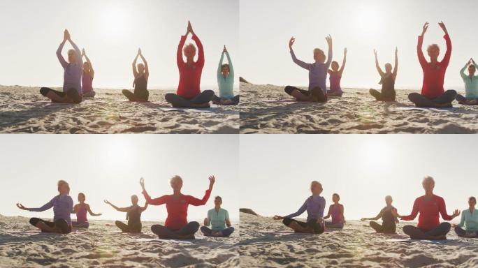 在海滩上做瑜伽的女运动员