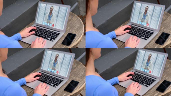 一个女人在用笔记本电脑开视频会议