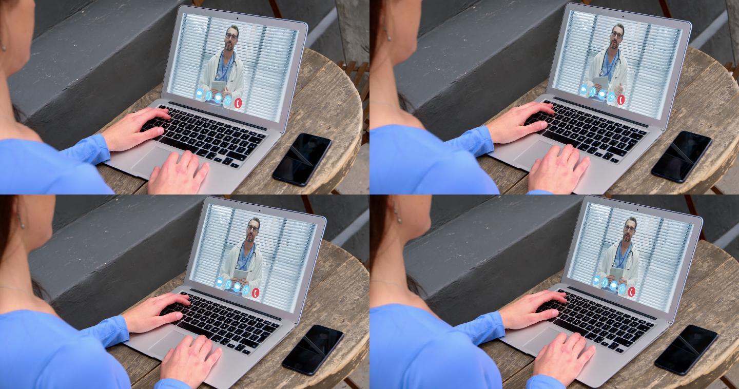 一个女人在用笔记本电脑开视频会议