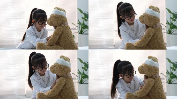 装扮成医生的小女孩给玩具小熊看病