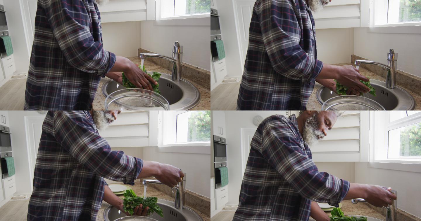 老人在家里的水槽里清理蔬菜