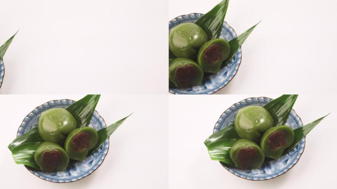 盘子上的青团中华菜品传统食品传统原料