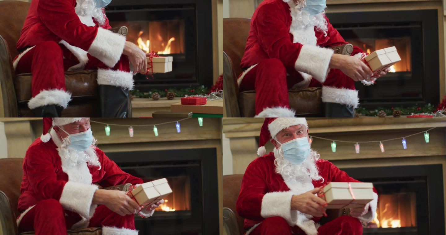 圣诞老人戴着面具送礼盒