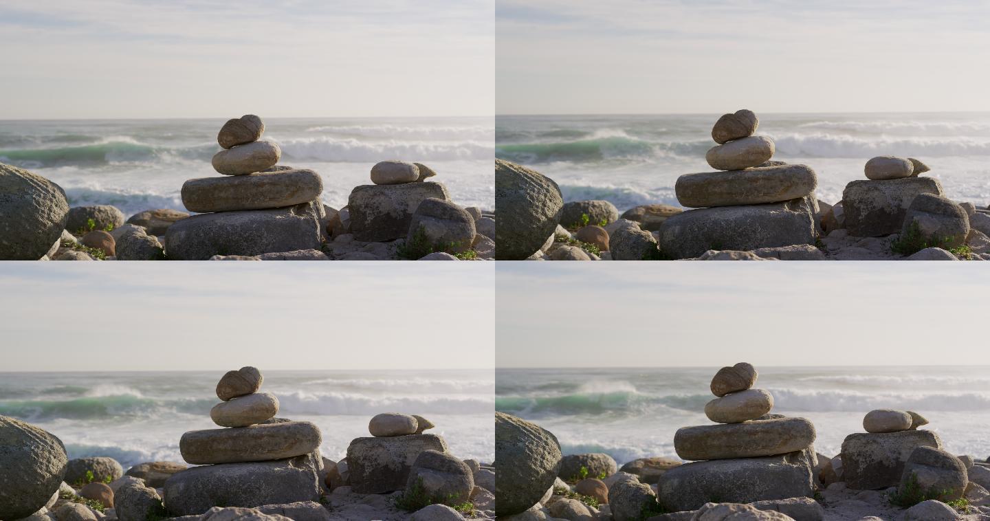 一个海滩上的岩石构造的特写与海洋和波浪