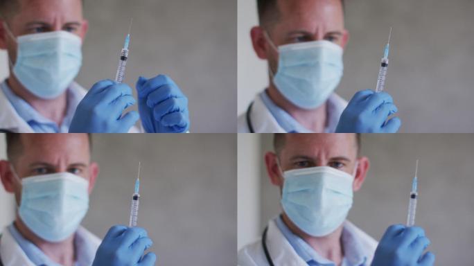 戴口罩准备疫苗的白人男医生肖像