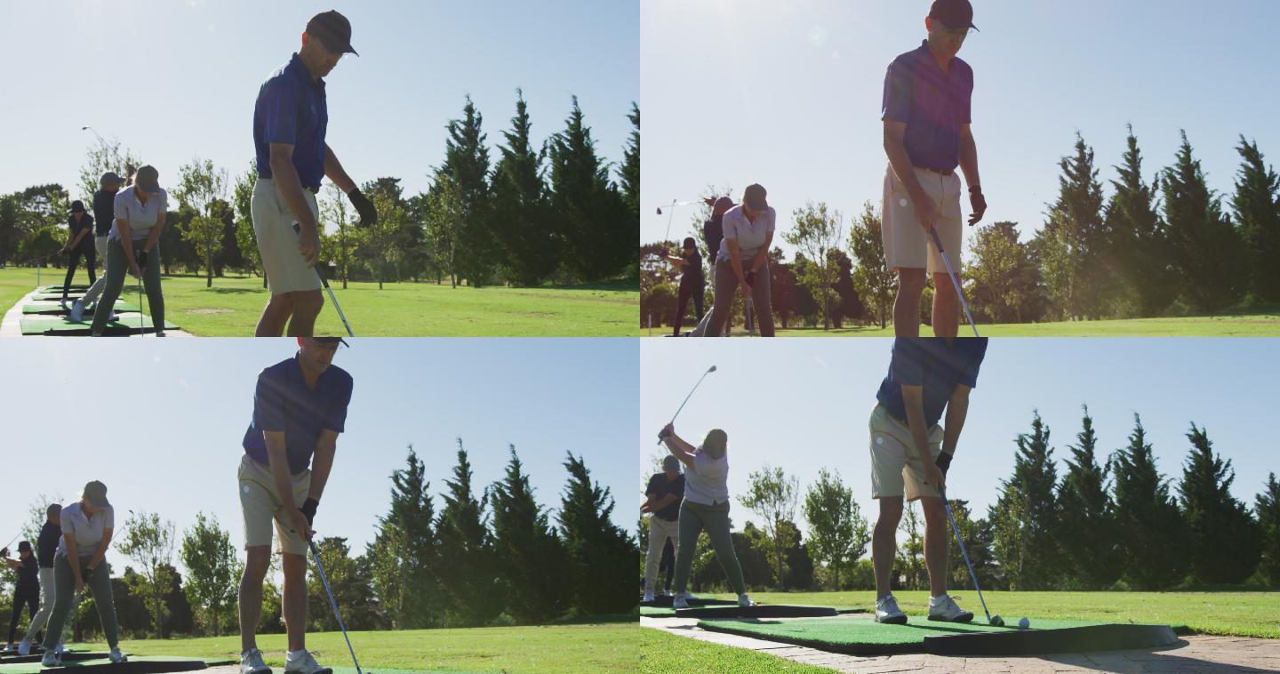 一个阳光明媚的日子，老年人在高尔夫球场练习高尔夫球