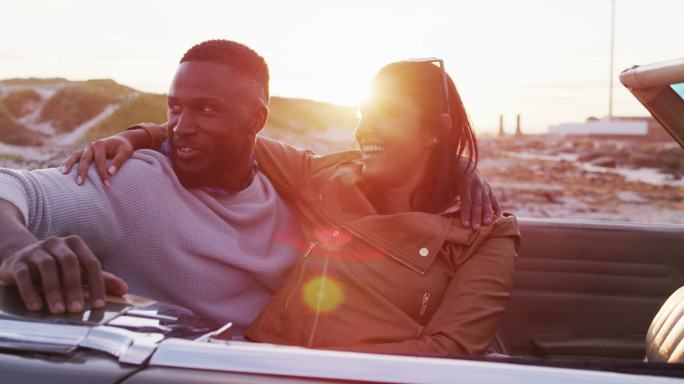 African american couple embracing each other while