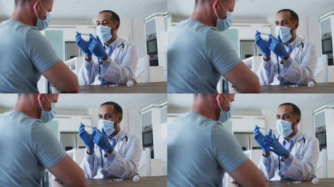 混血男医生戴口罩前在家咨询男患者接种疫苗