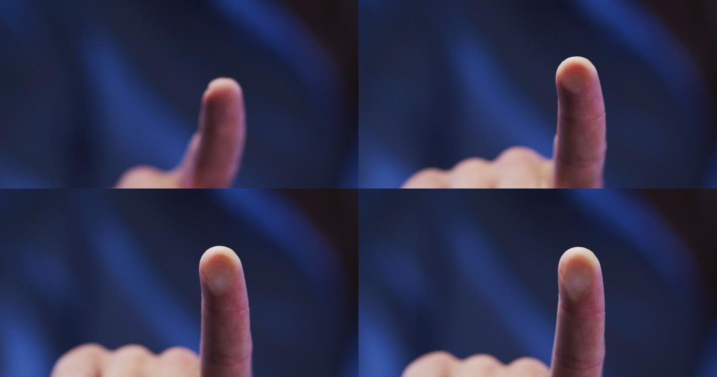 白种人男子的食指使用数字界面，将指纹应用到触摸屏上