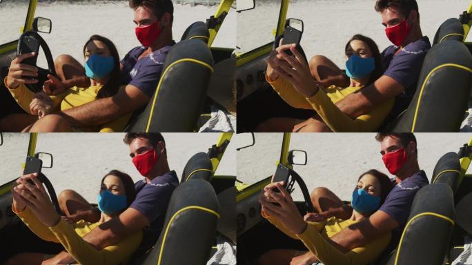 幸福的白人夫妇戴着面具坐在沙滩车自拍