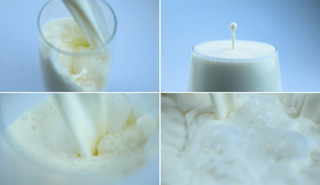 牛奶液体倒牛奶飞溅奶滴实拍视频