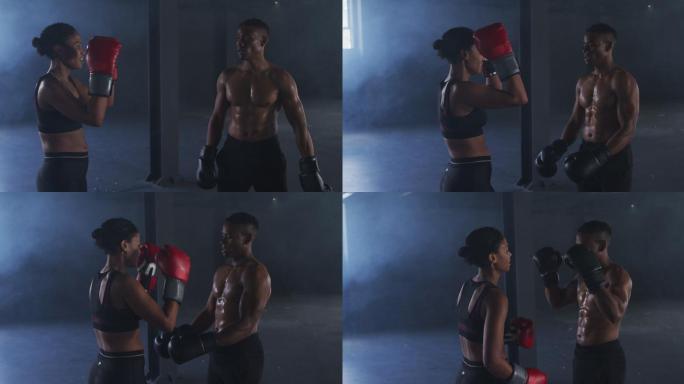 非洲裔美国男人和女人戴着拳击手套在空房间里训练投掷拳头