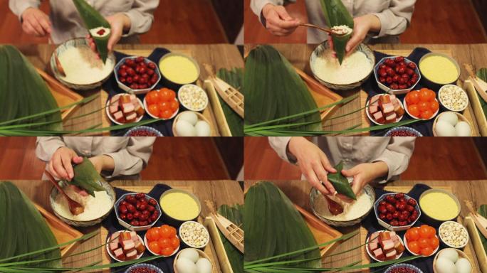 包粽子特写传统节日端午包粽子糯米粽子