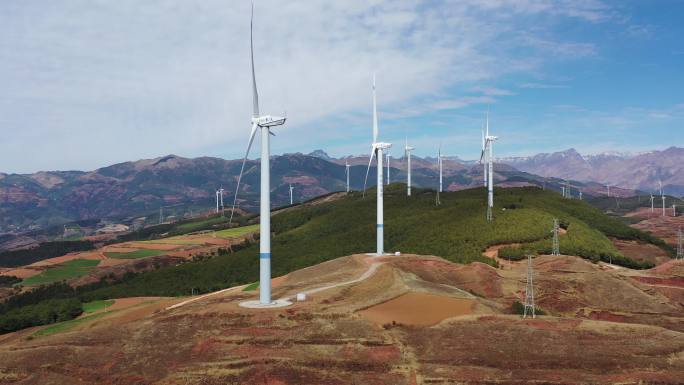 航拍红土高原上的风力发电机
