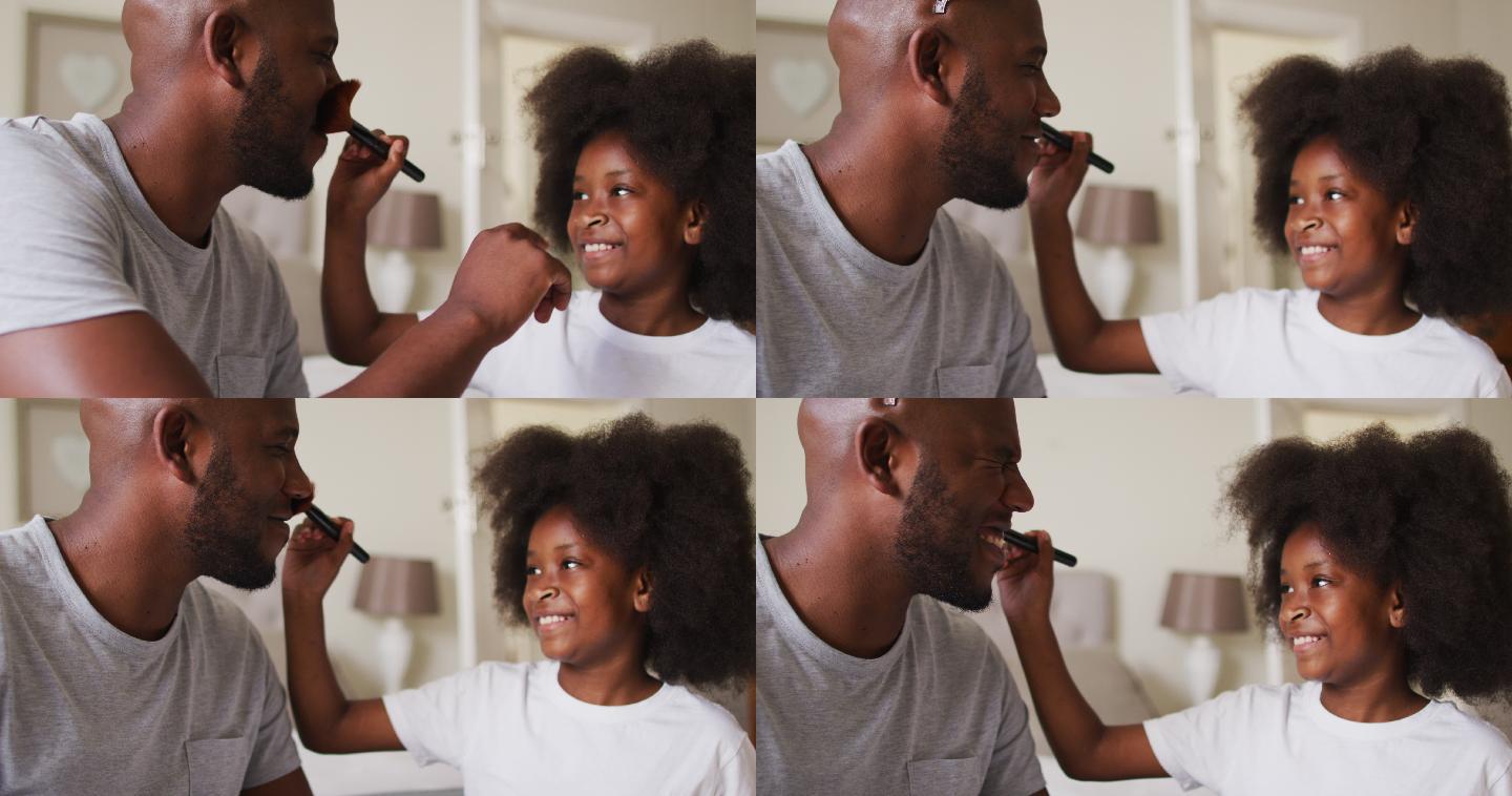 非裔美国女孩在家给戴着皇冠的父亲化妆