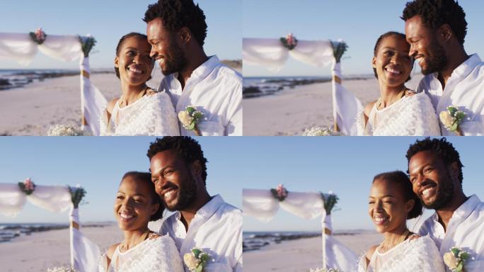 一对非裔美国情侣在沙滩上喜结连理