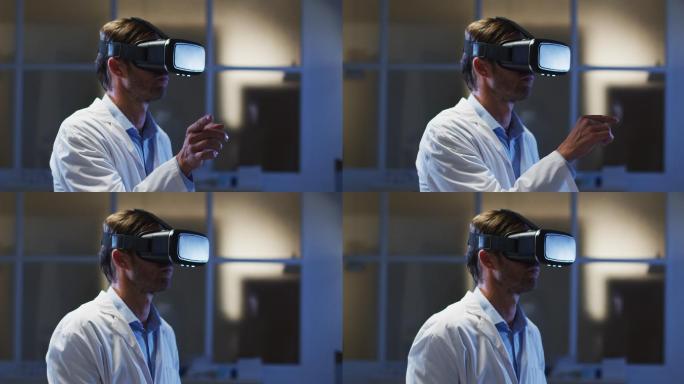 白人男医生戴着虚拟现实头盔使用虚拟界面