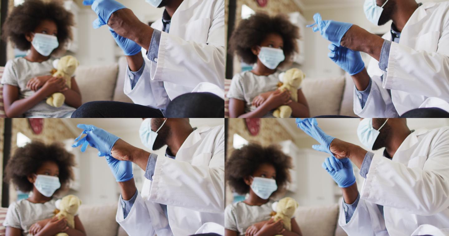 非裔美国医生在家戴着外科手套戴口罩