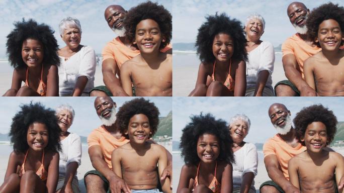 混合种族的老夫妇和孙子坐在海滩上微笑