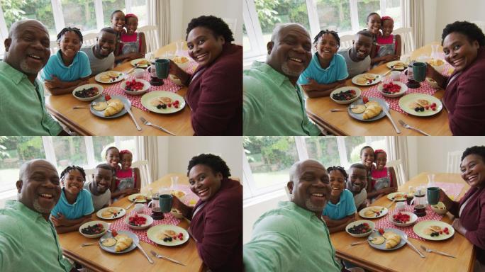 一个三代非裔美国家庭在一起吃早餐的时候自拍