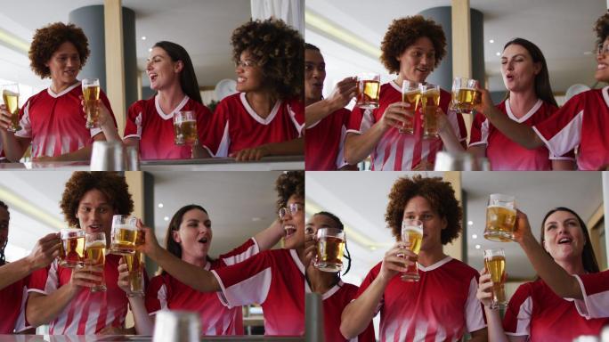 一群快乐的朋友在酒吧观看比赛，举起酒杯祝酒