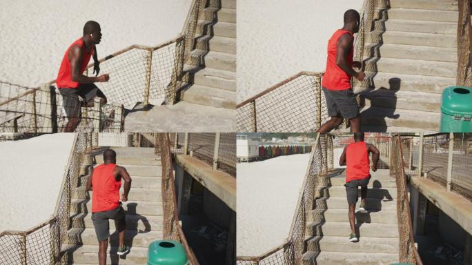 非裔美国人跑上楼梯，在海边做户外运动