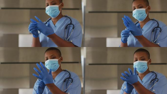 非裔美国女医生戴口罩和手套