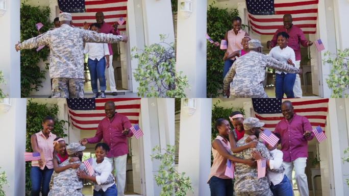非裔美国士兵父亲抱着激动的家人在美国国旗的房子前面