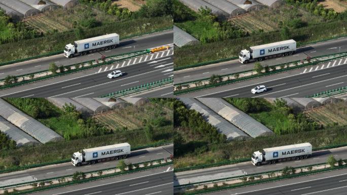 货车在高速上行驶物流配送卡车公路运输航拍
