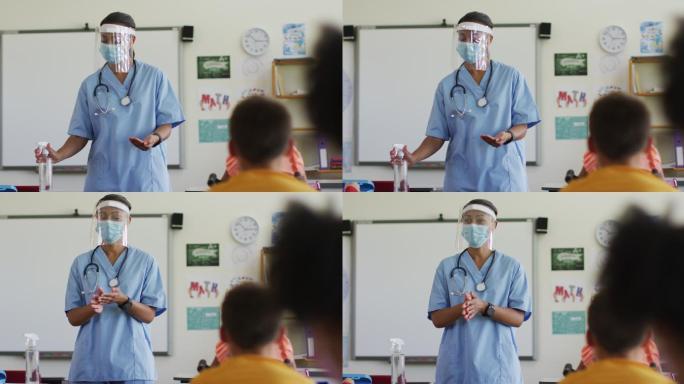 戴着口罩的女医务人员向学童示范如何消毒双手