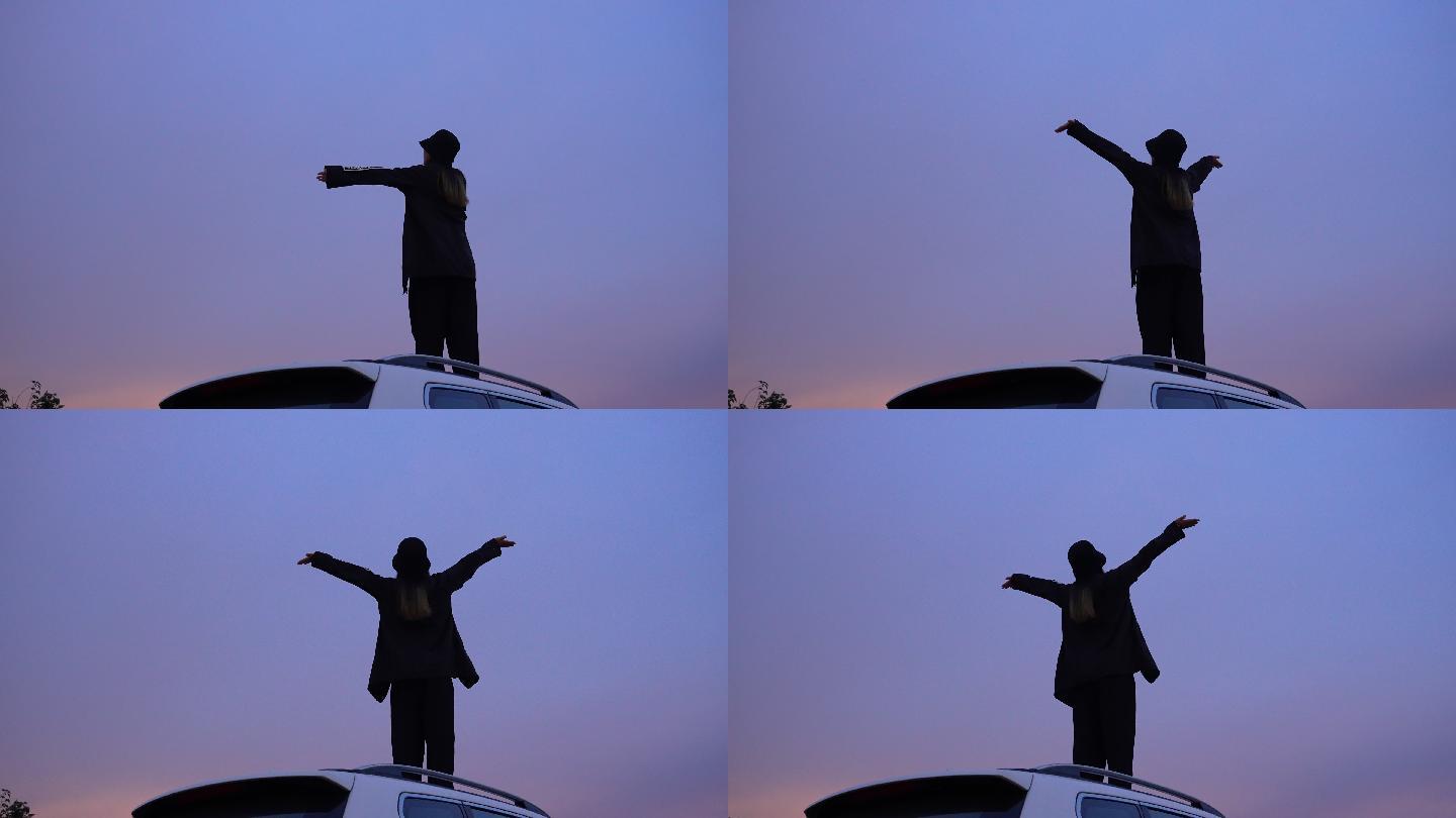 张开双臂拥抱天空的女孩