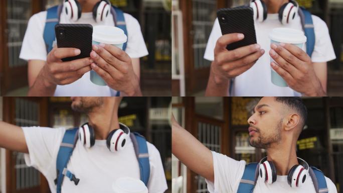 混血男子一边喝咖啡一边在街上用智能手机