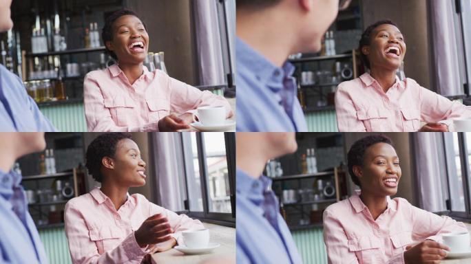 两位快乐的男女朋友坐在咖啡馆里喝着咖啡，谈笑风生