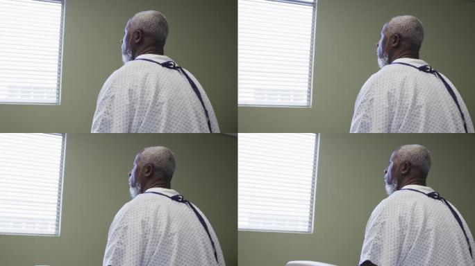沮丧的非洲裔美国老年男性病人在医院看窗外