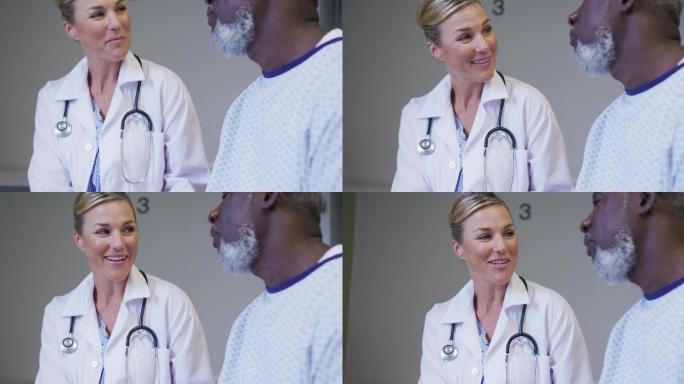 白人女医生在医院与非裔美国老年男性病人交谈