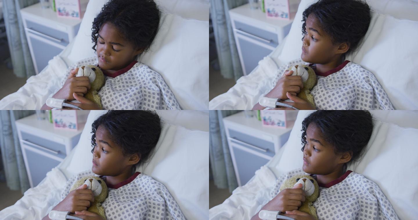 混血女孩在病房里小朋友病床上孤独的孩子期