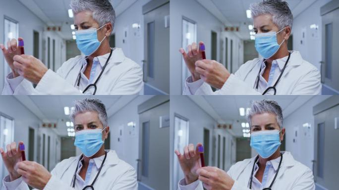 医护人员工作场景医生看镜头医生看抽血管