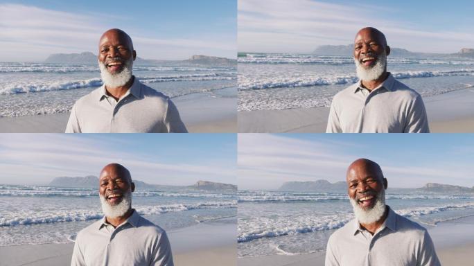 一位年长的非洲裔美国人在海滩上微笑