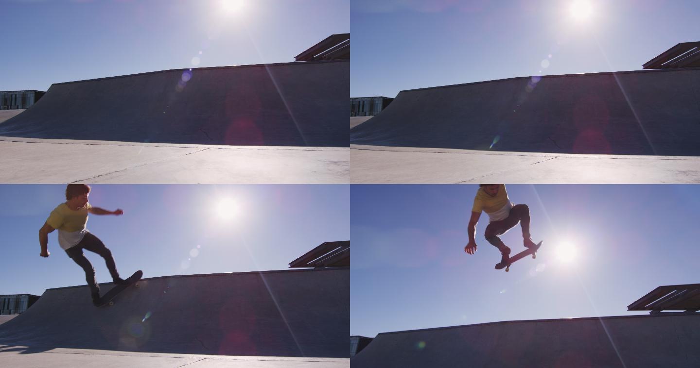 一名白人男子在阳光明媚的日子里骑滑板、跳滑板