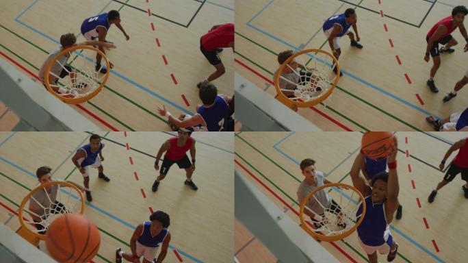 头顶视图的非裔美国男性篮球运动员得分目标对不同的球员