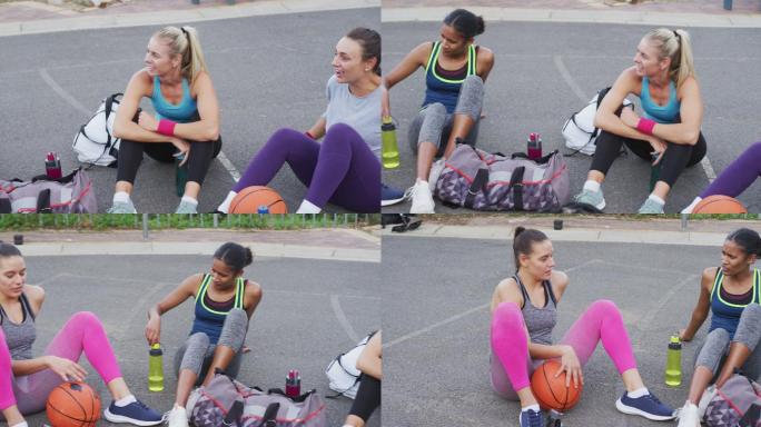 不同的女子篮球队坐在地上聊天