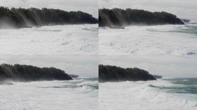 海面大浪滚滚，海岸线雾气腾腾的壮观景象