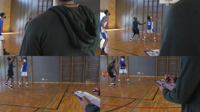 不同类型的男子篮球队在比赛中，教练拿着剪贴板，戴着口罩