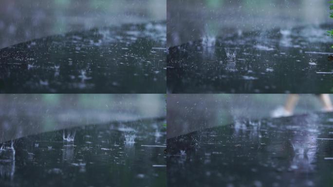下雨 雨水 雨滴 落在地面的雨滴溅开