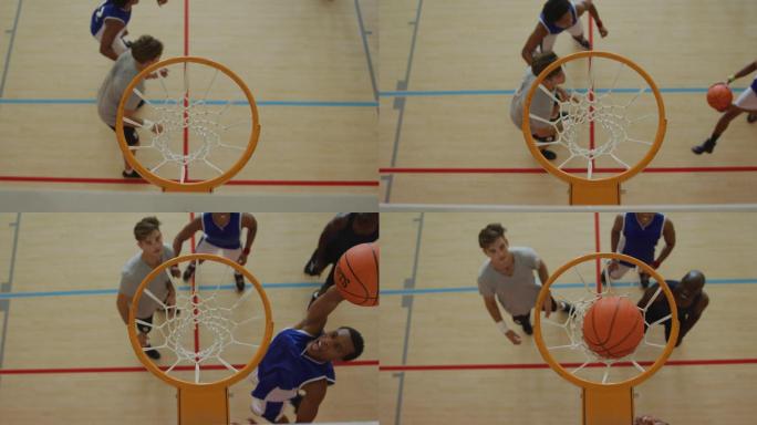 头顶视图的非裔美国男性篮球运动员得分目标对不同的球员