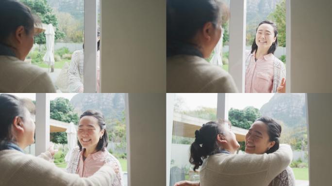快乐的亚洲母亲抱着成年女儿来到后门