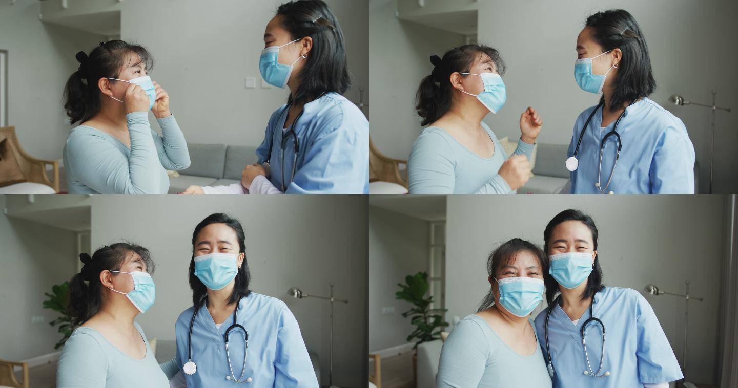 亚洲女护士和病人戴着口罩在医院对着摄像机说话和看