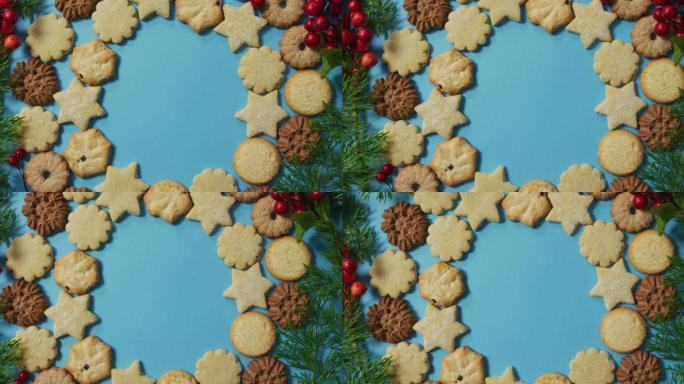 圣诞装饰与饼干和复制空间的蓝色背景