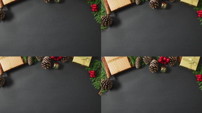 圣诞节的装饰与松果和拷贝空间在黑色背景的视频