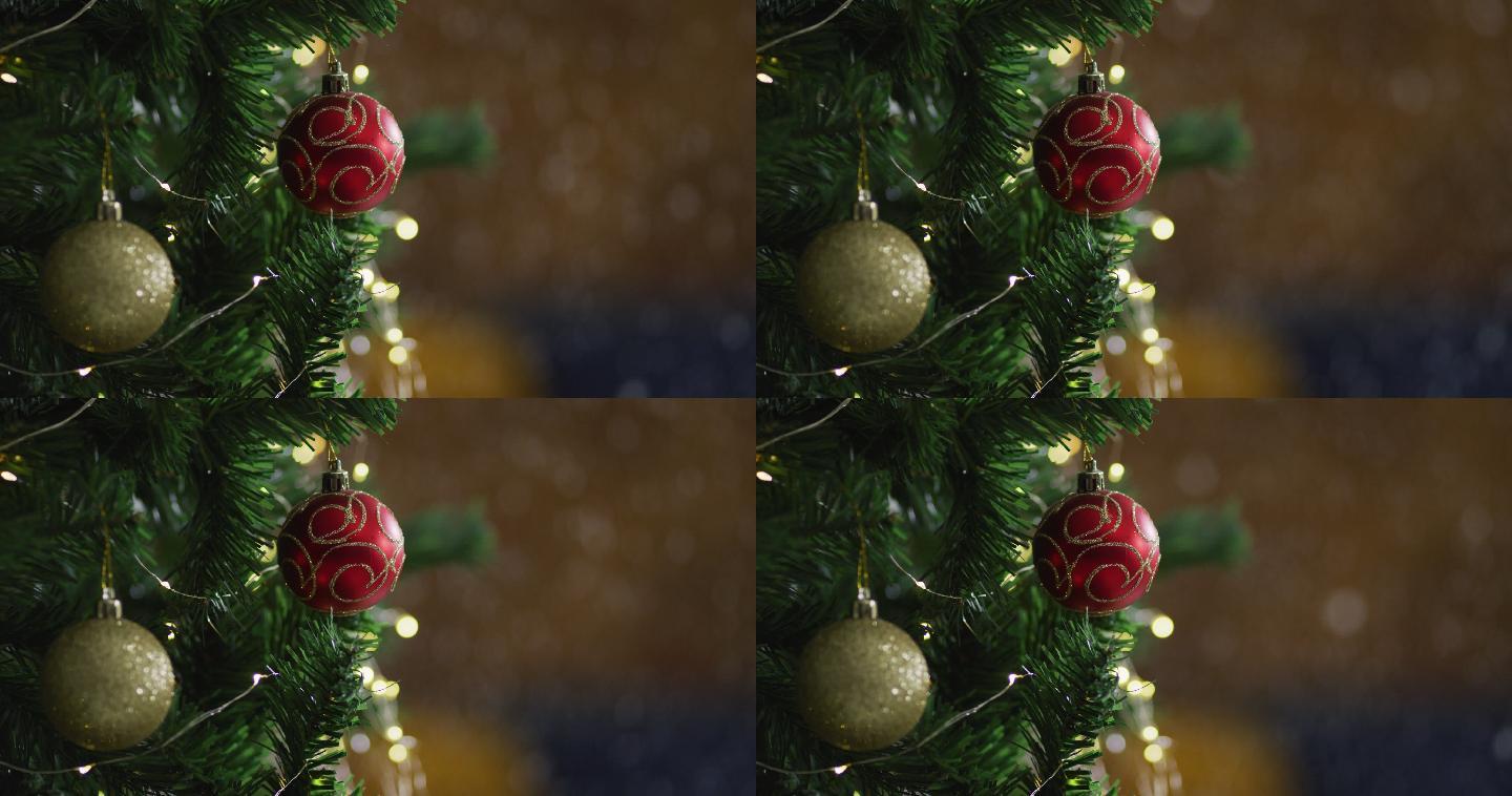 在模糊的背景上用小玩意和仙女灯装饰的圣诞树的视频